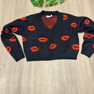 Madden NYC Black and Red Lip Print Women's Sweater